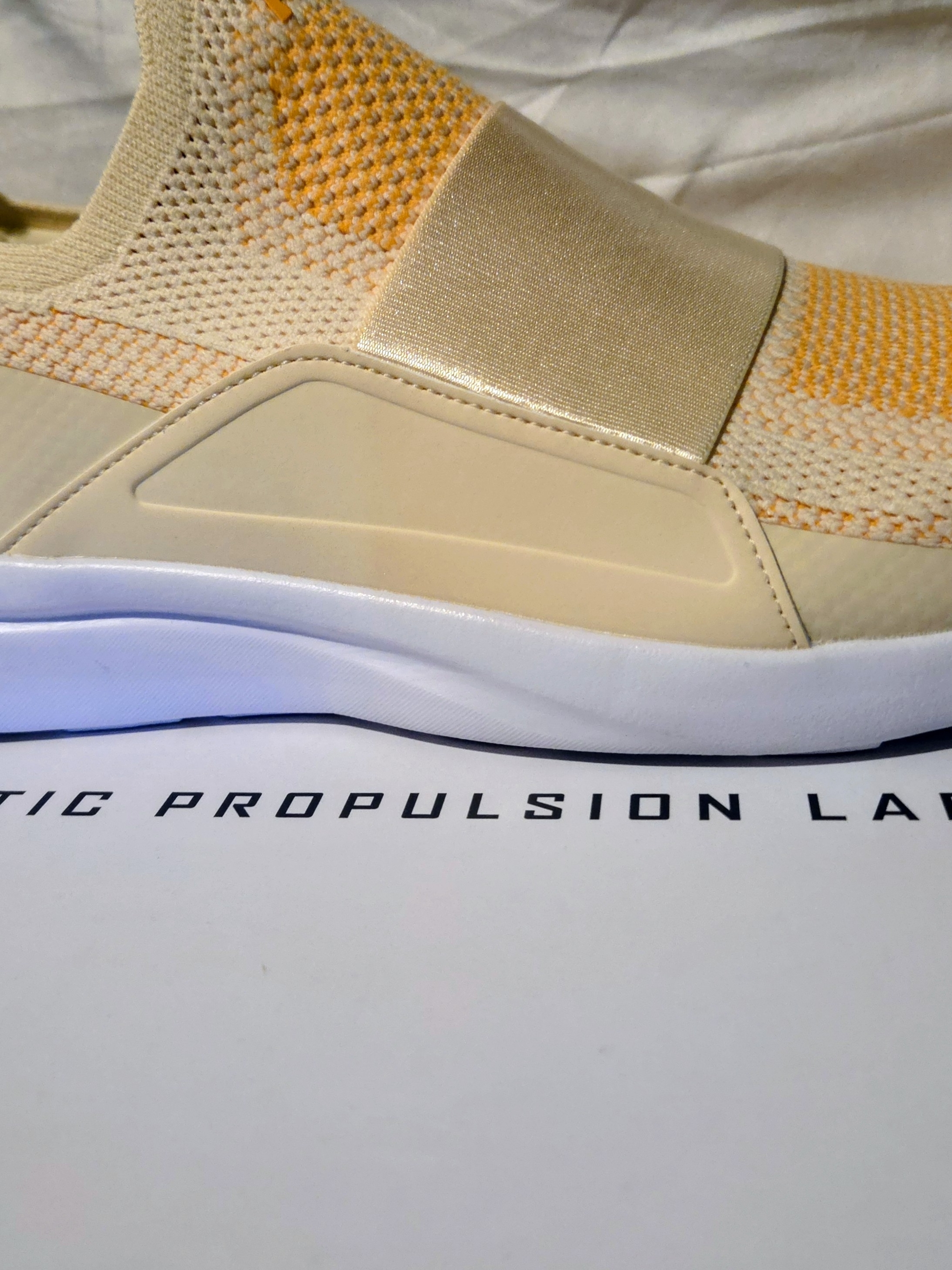 Apl Techloom Bliss Knit Sneaker In Vanilla, Mango, And White